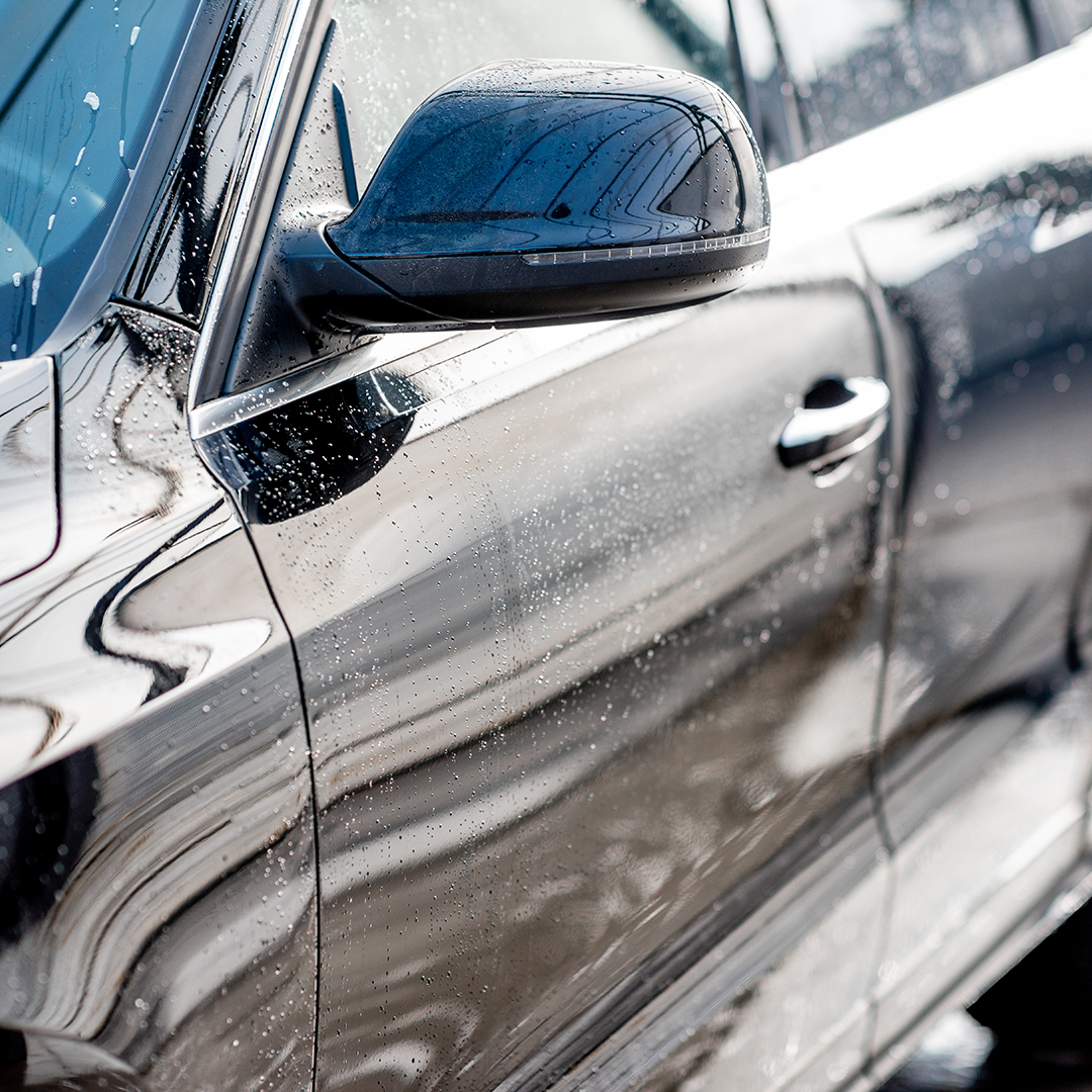 Car with a high-gloss, showroom-quality shine after professional detailing